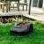 Scheppach Mähroboter RLM500W bis zu 500 qm² | 18cm Schnittbreite | 20-60 mm Schnitthöhe | Regensensor | WiFi & BT | App gesteuert | 35% Steigung | inkl. Station, 9 Messer, 100m Kabel & 130 Bodenhaken - 7